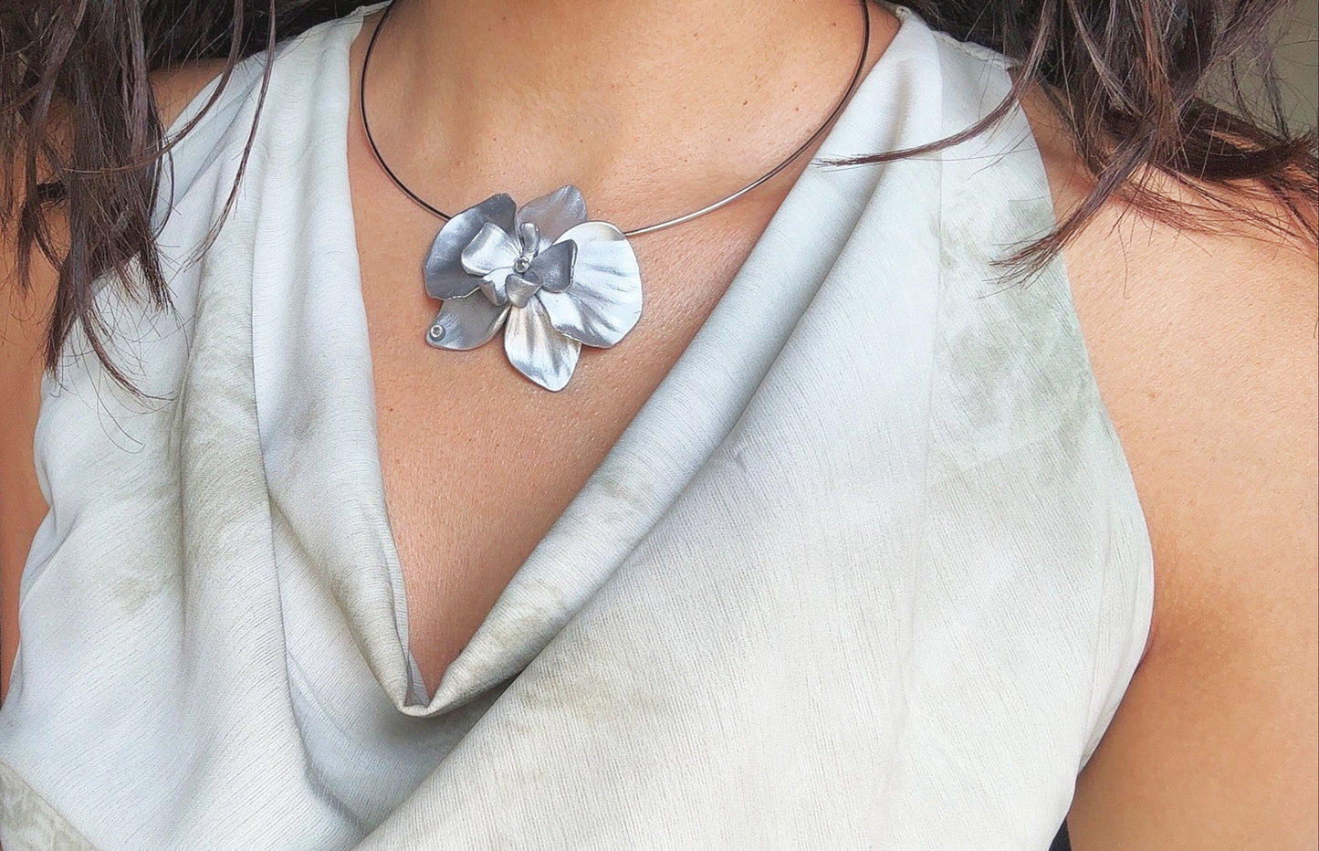 Artistic floral statement necklace with handcrafted orchid pendant in polymer clay