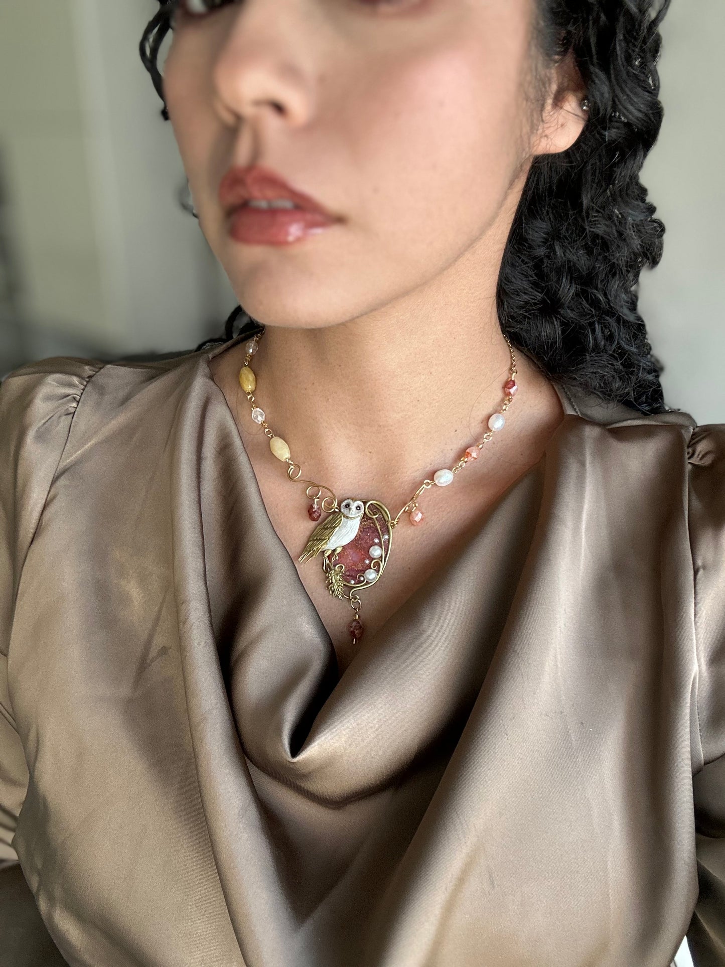 Luxury handmade necklace with owl design, baroque pearls, quartz, and artistic golden wing detail