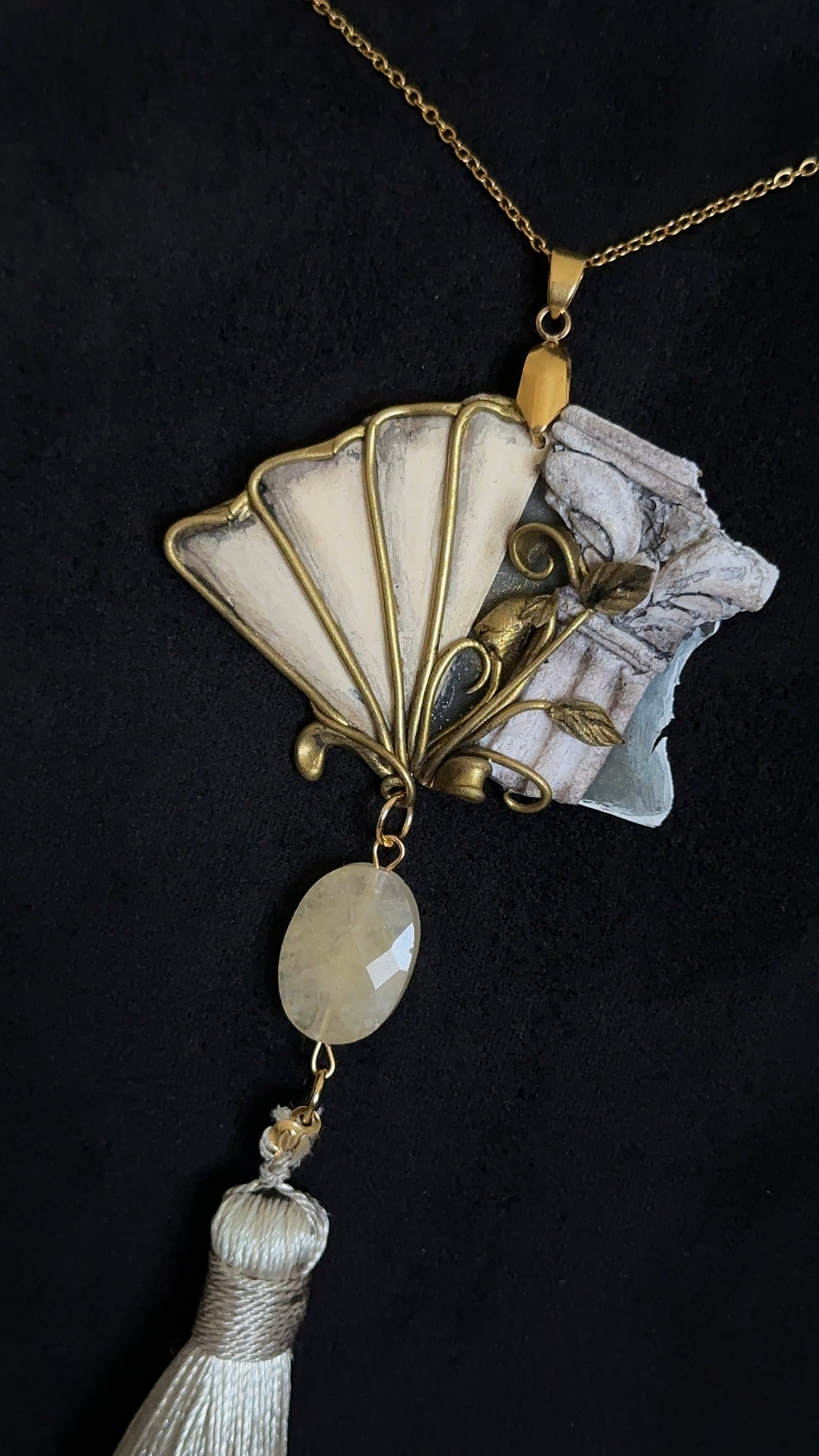     One-of-a-kind fan statement necklace with architectural textures, handmade sculptural pendant and tassel, wearable art jewelry for refined style.