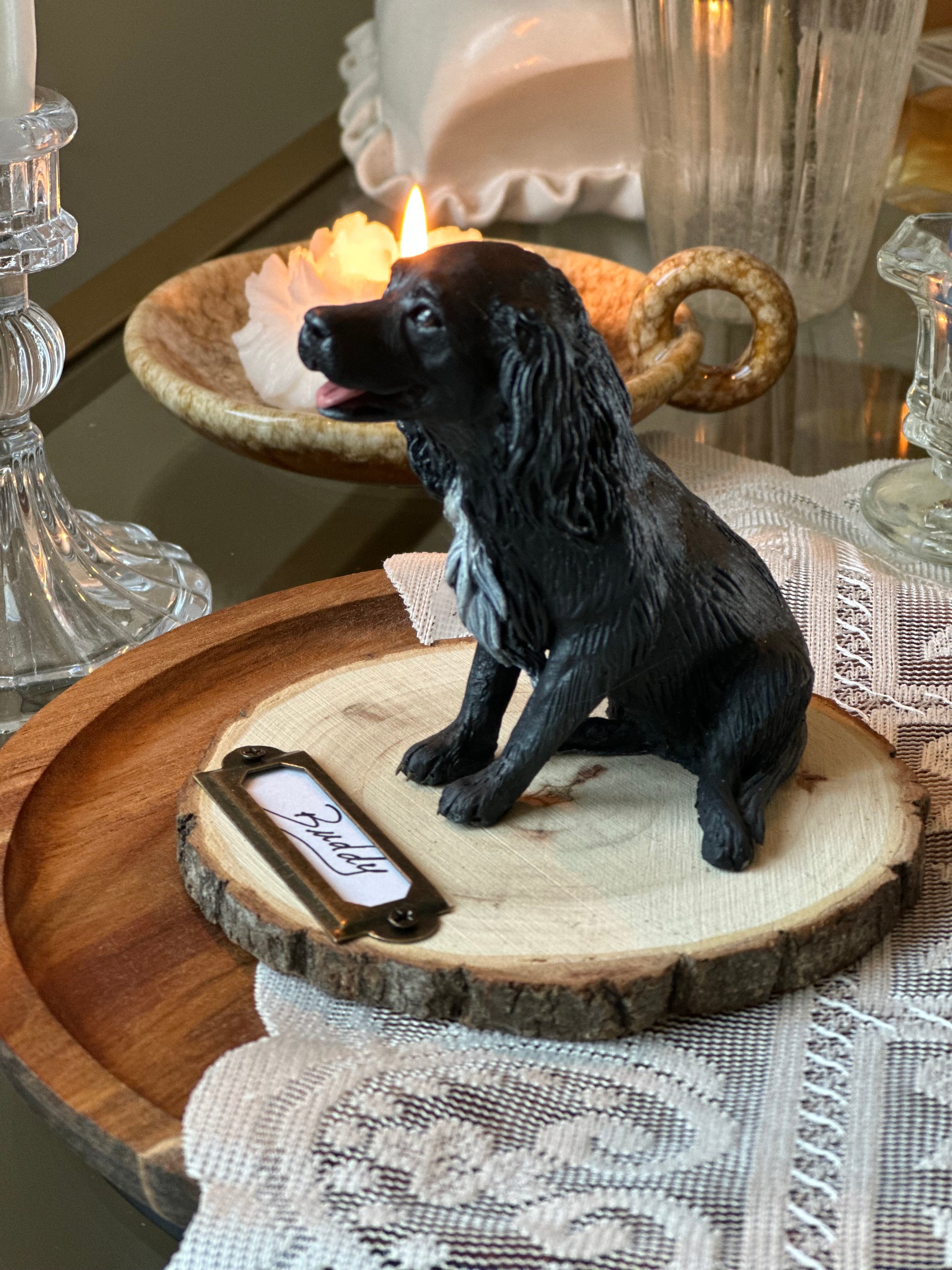 Hand-sculpted black Spaniel dog memorial statue in cold porcelain, custom lifelike pet sculpture on wooden base with engraved nameplate “Buddy