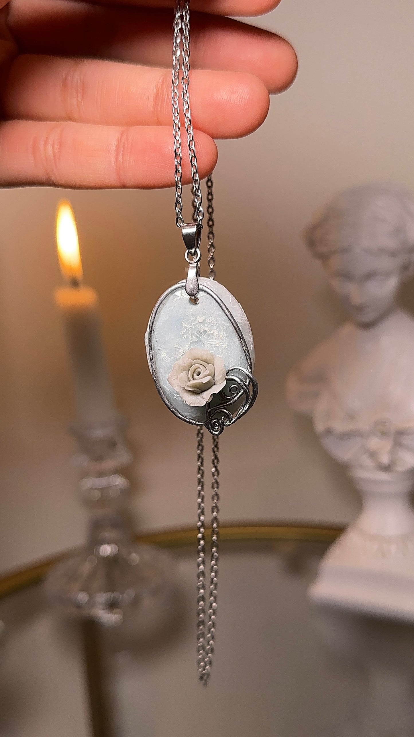 Winter rose pendant necklace styled as elegant statement accessory for curated wardrobes and GRWM outfit videos